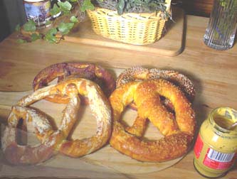 soft pretzels, with different toppings 